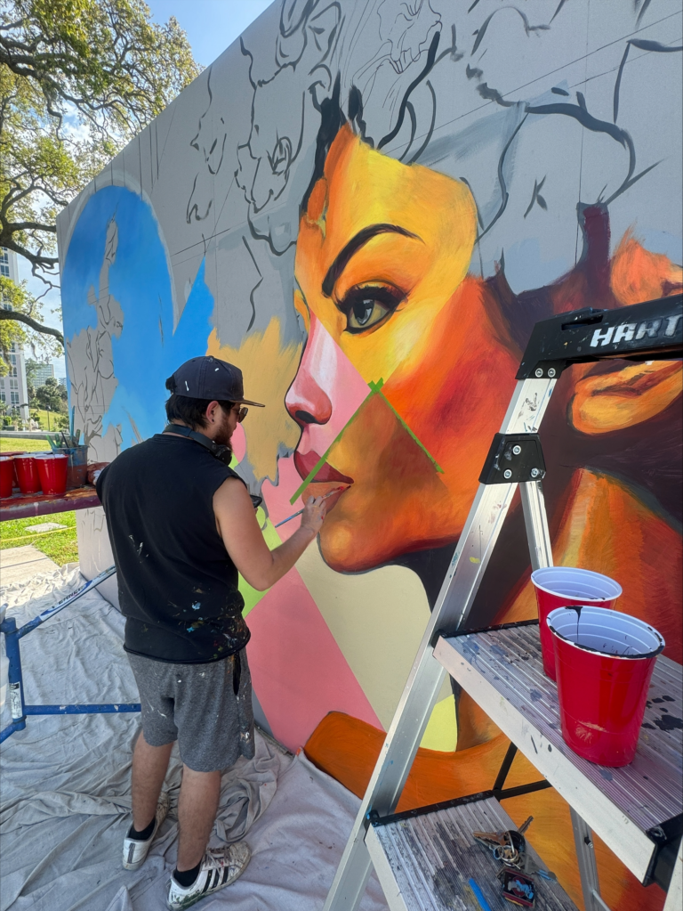 Carlos Pons working on a mural for the City of Clearwater